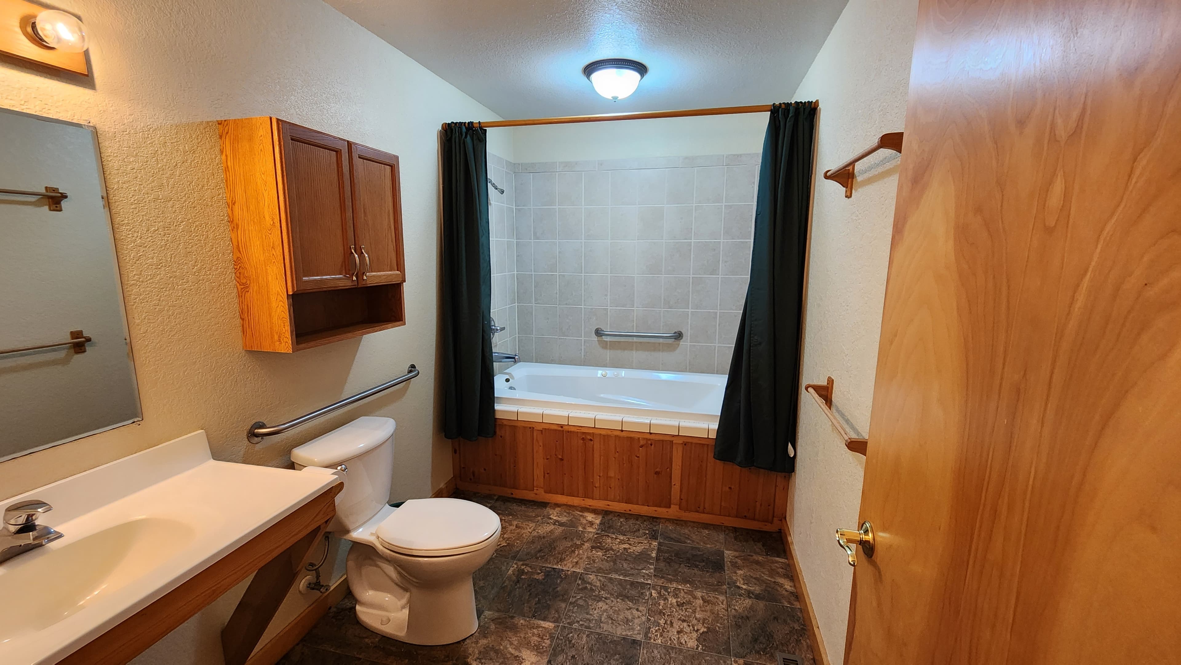 2nd floor bathroom with jacuzzi tub shower.